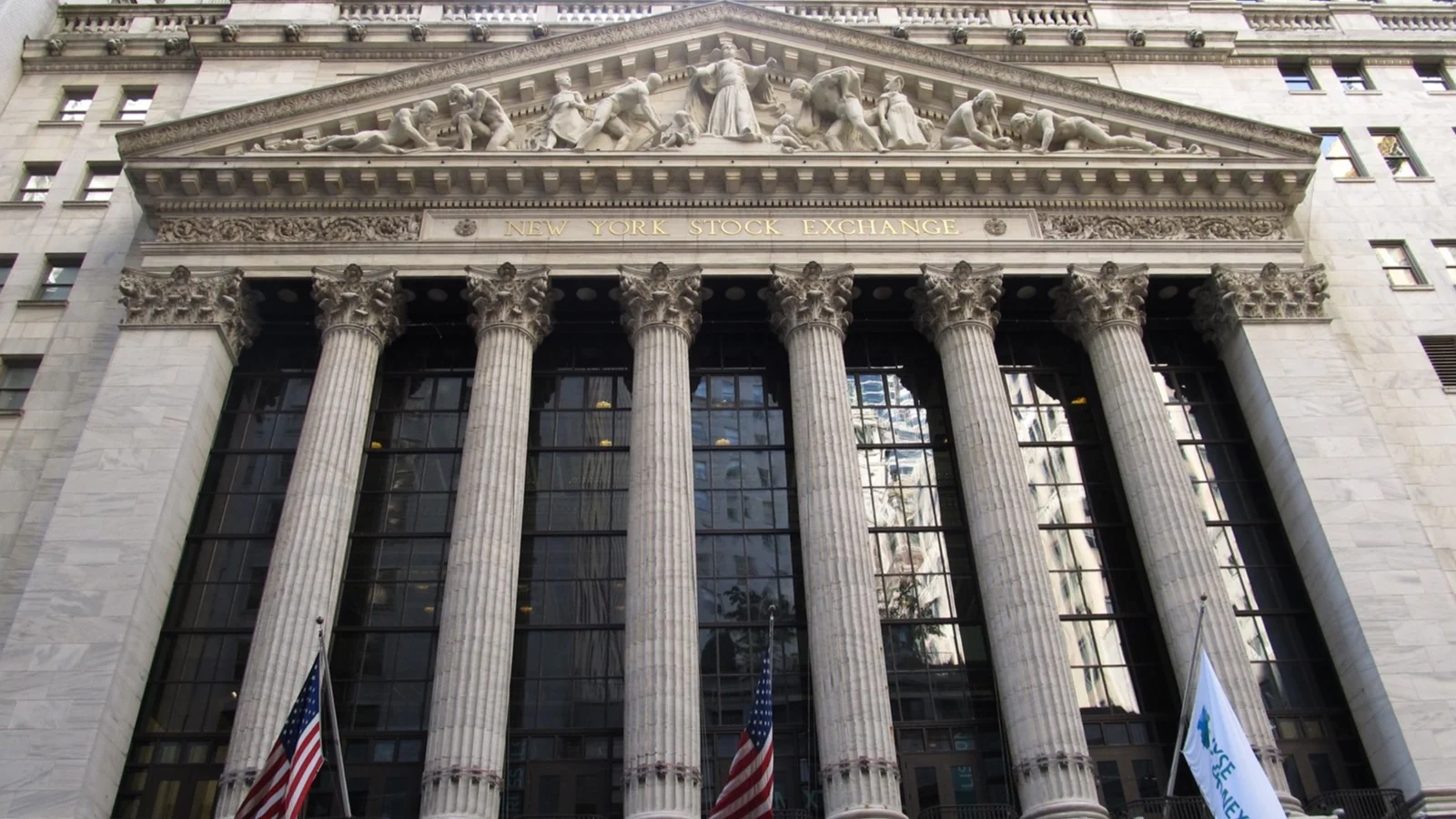 New York Stock Exchange exterior at dawn